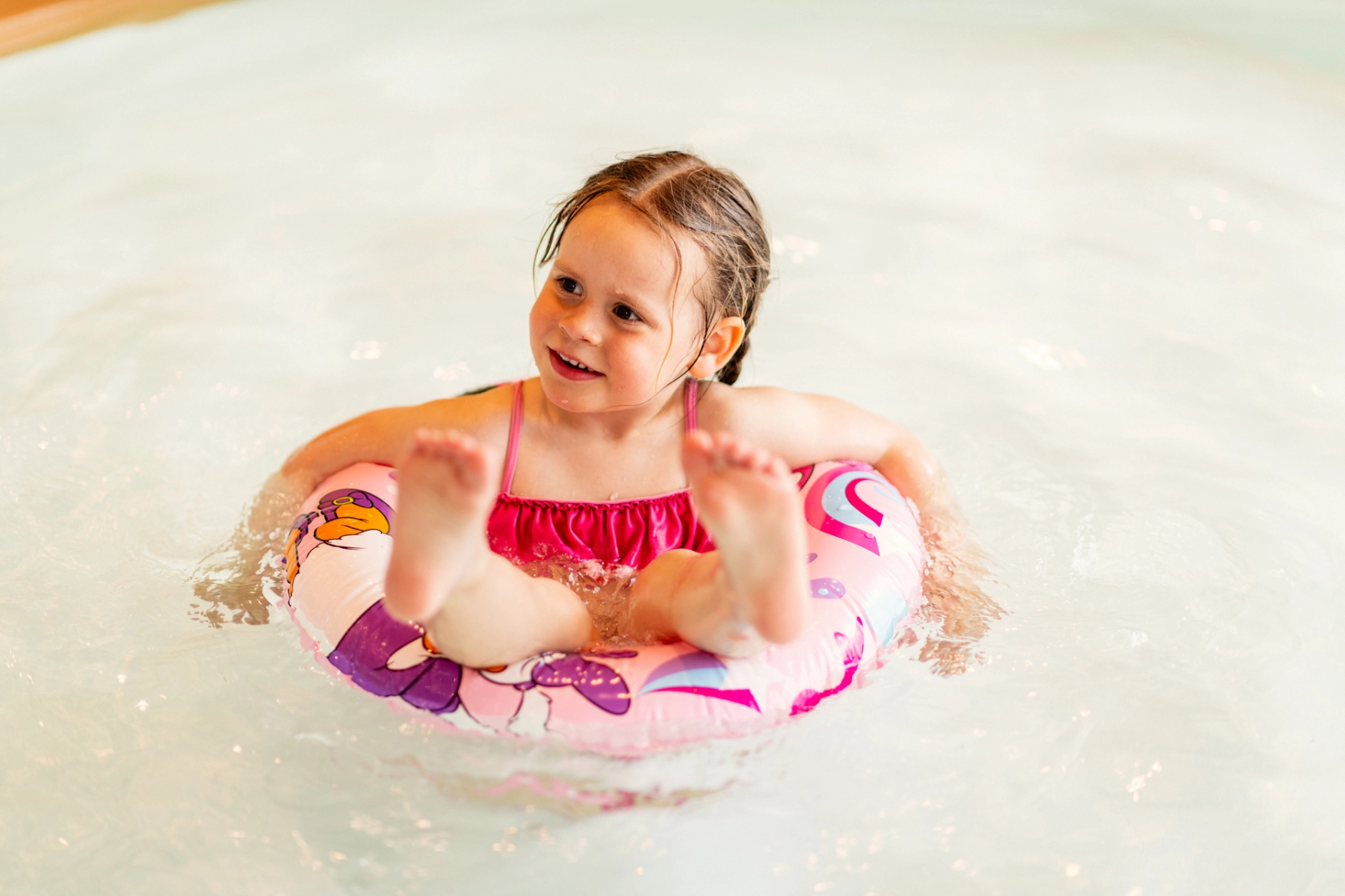Kid with swimming ring